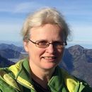 Photo of Prof. Dr. Ina Tegen with mountains in the background