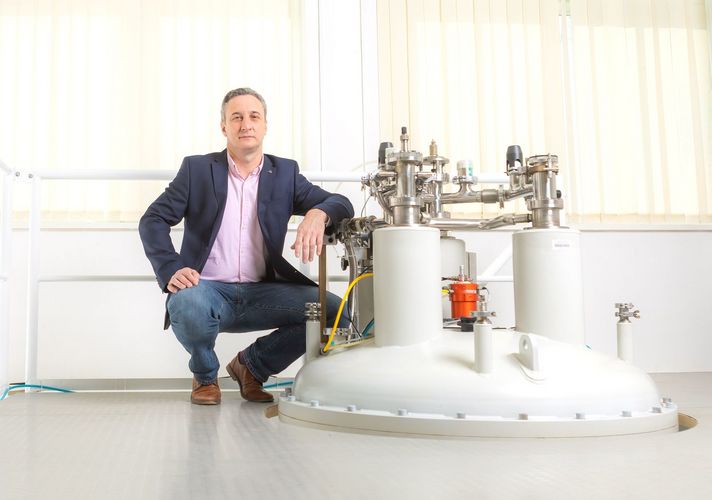 Professor Rustem Valiullin with a nuclear magnetic resonance spectrometer.